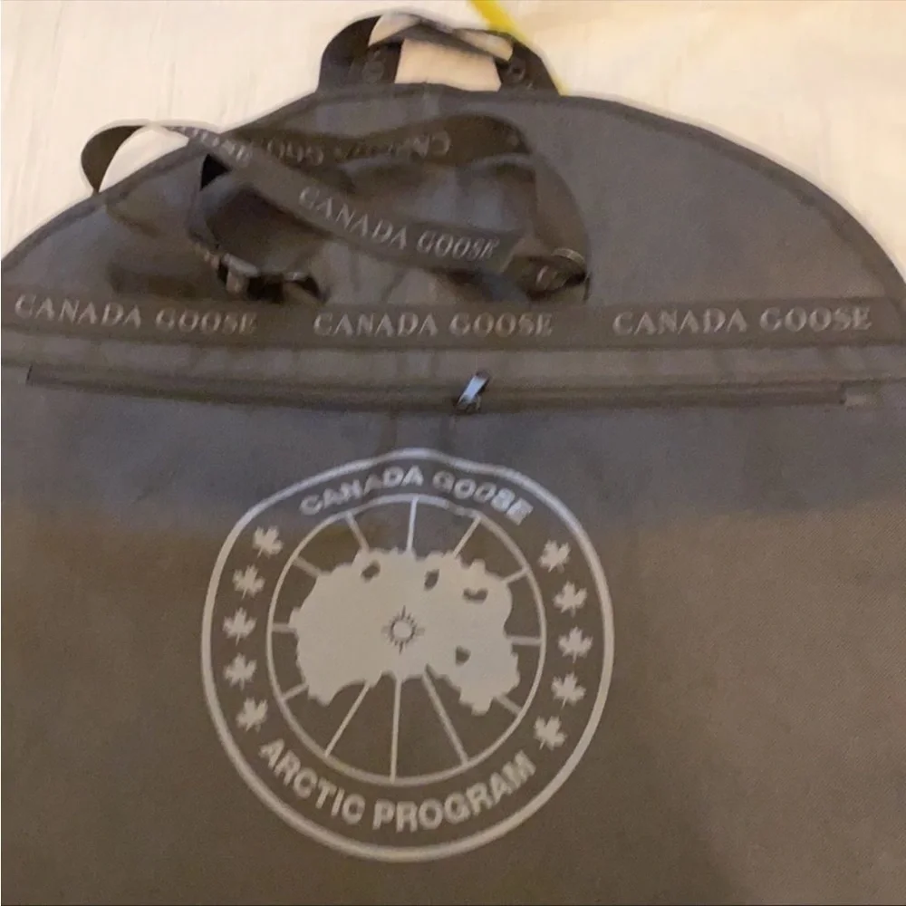 Canada Goose coat black dust bag . New.